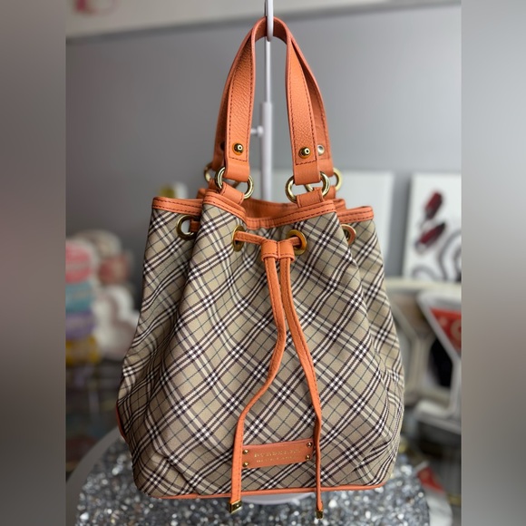 Burberry Handbags - Burberry Blue Label Nova Check drawstring bucket bag EUC